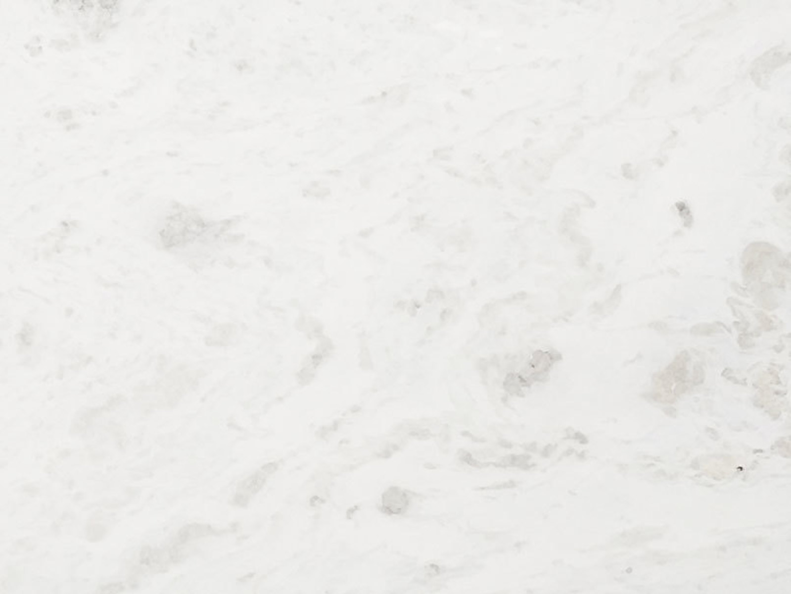 Closeup image of Absolute White Marble countertop slab