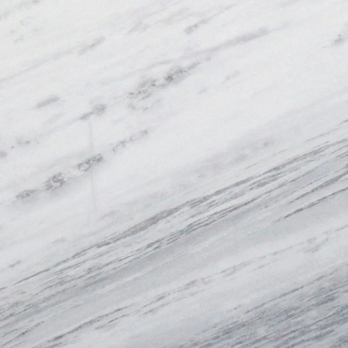 Closeup image of Arabescus White Marble countertop slab