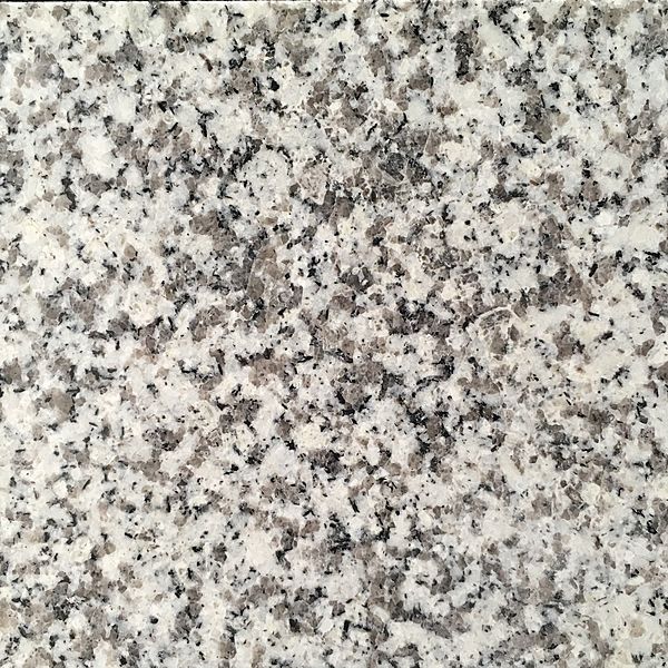 Closeup image of Bianco Diamante Cream Granite countertop slab