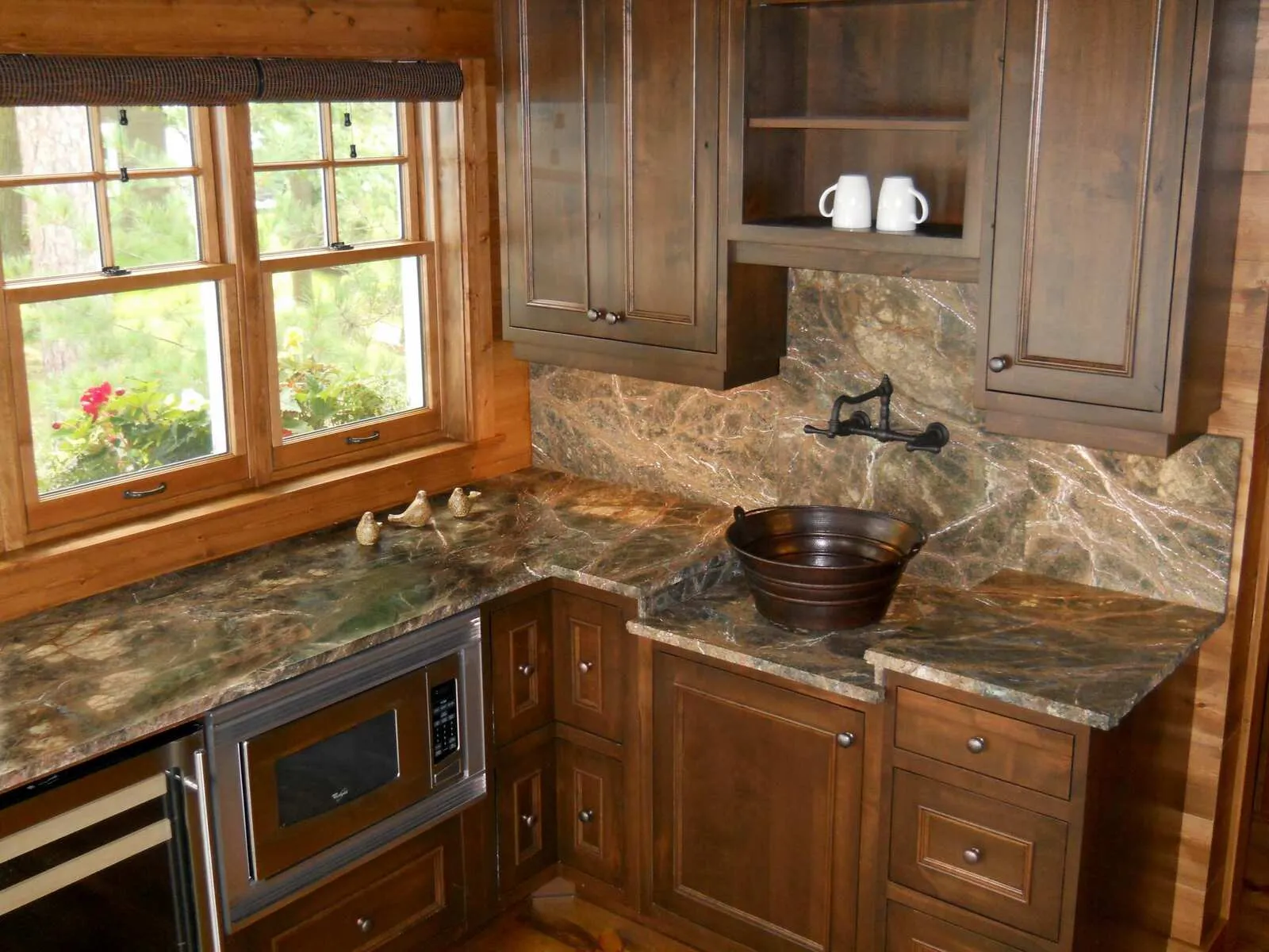 Image of installed Rainforest Green Marble countertops