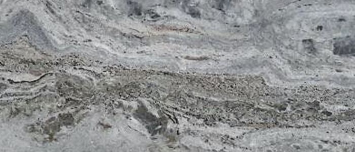 Closeup image of River Blue Grey Marble countertop slab