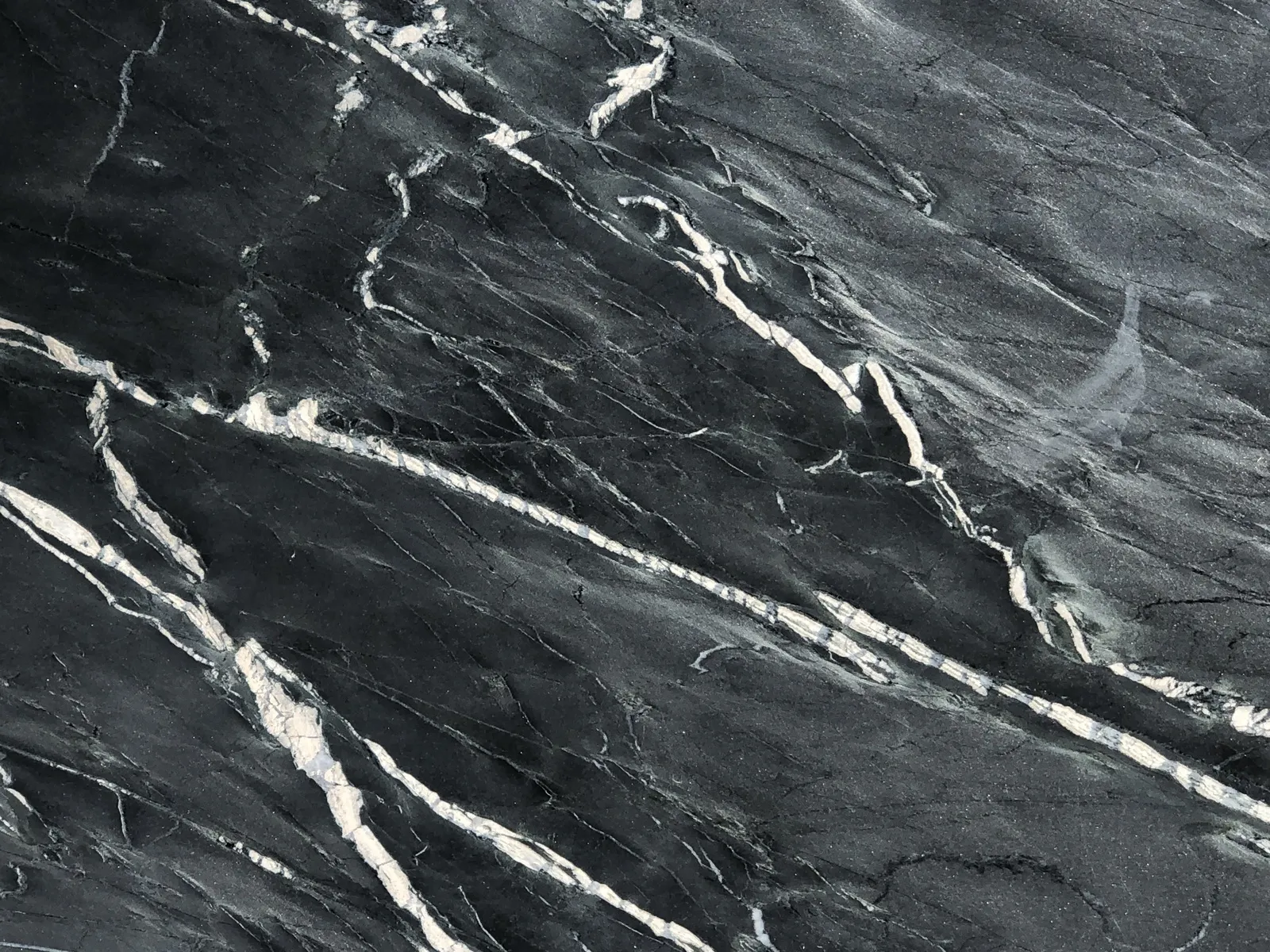 Closeup image of Marine Black Soapstone countertop slab