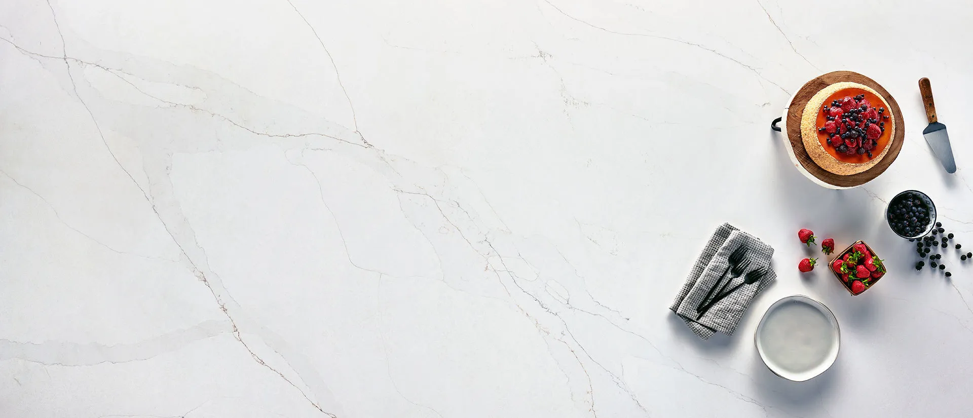 Image of installed Q Quartz Calacatta Abezzo Quartz countertops