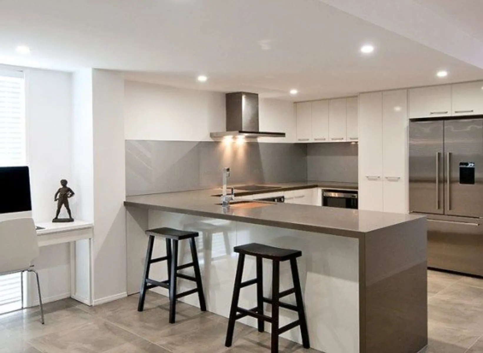 Image of installed Vicostone Smokey Quartz countertops