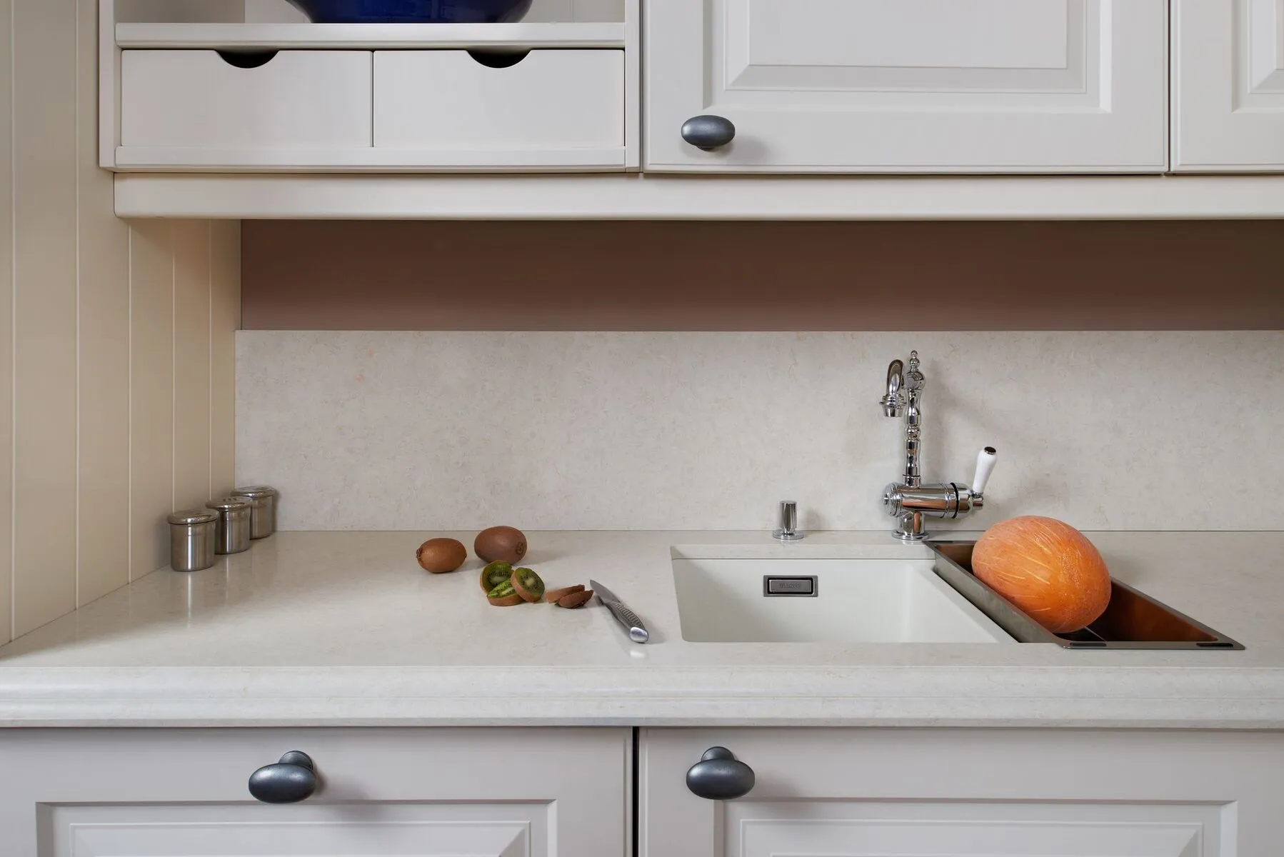 Image of installed Vicostone Taj Mahal Grey Quartz countertops