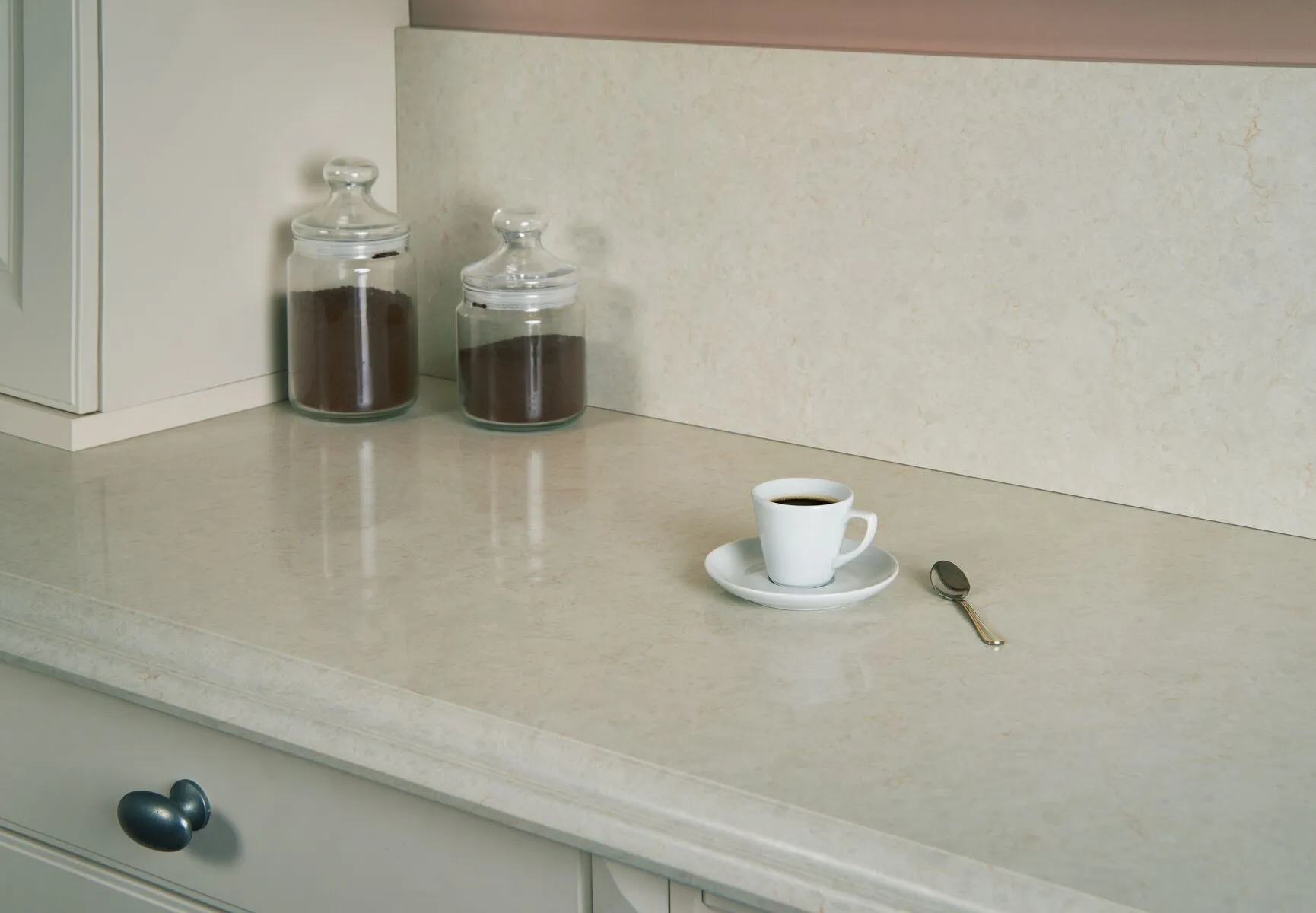 Image of installed Vicostone Taj Mahal Grey Quartz countertops