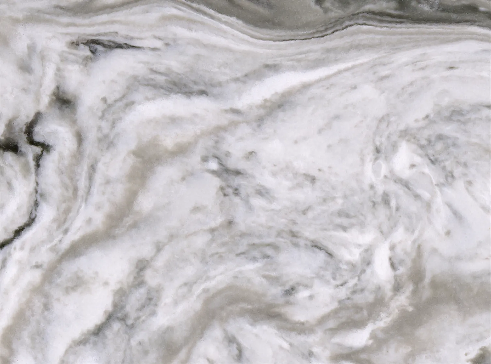 Closeup image of Vicostone Avalanche White Quartz countertop slab
