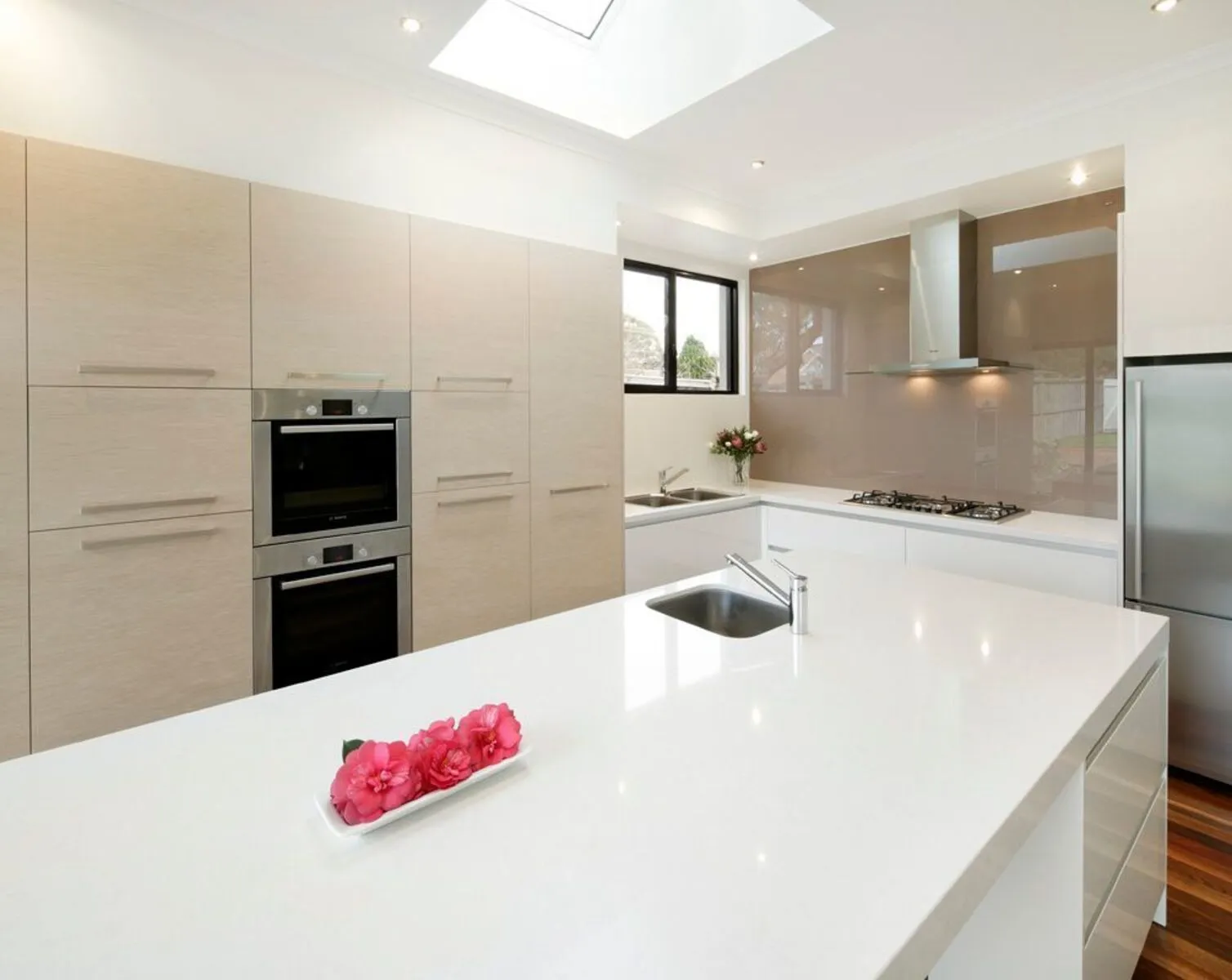 Image of installed Vicostone Onyx White Quartz countertops