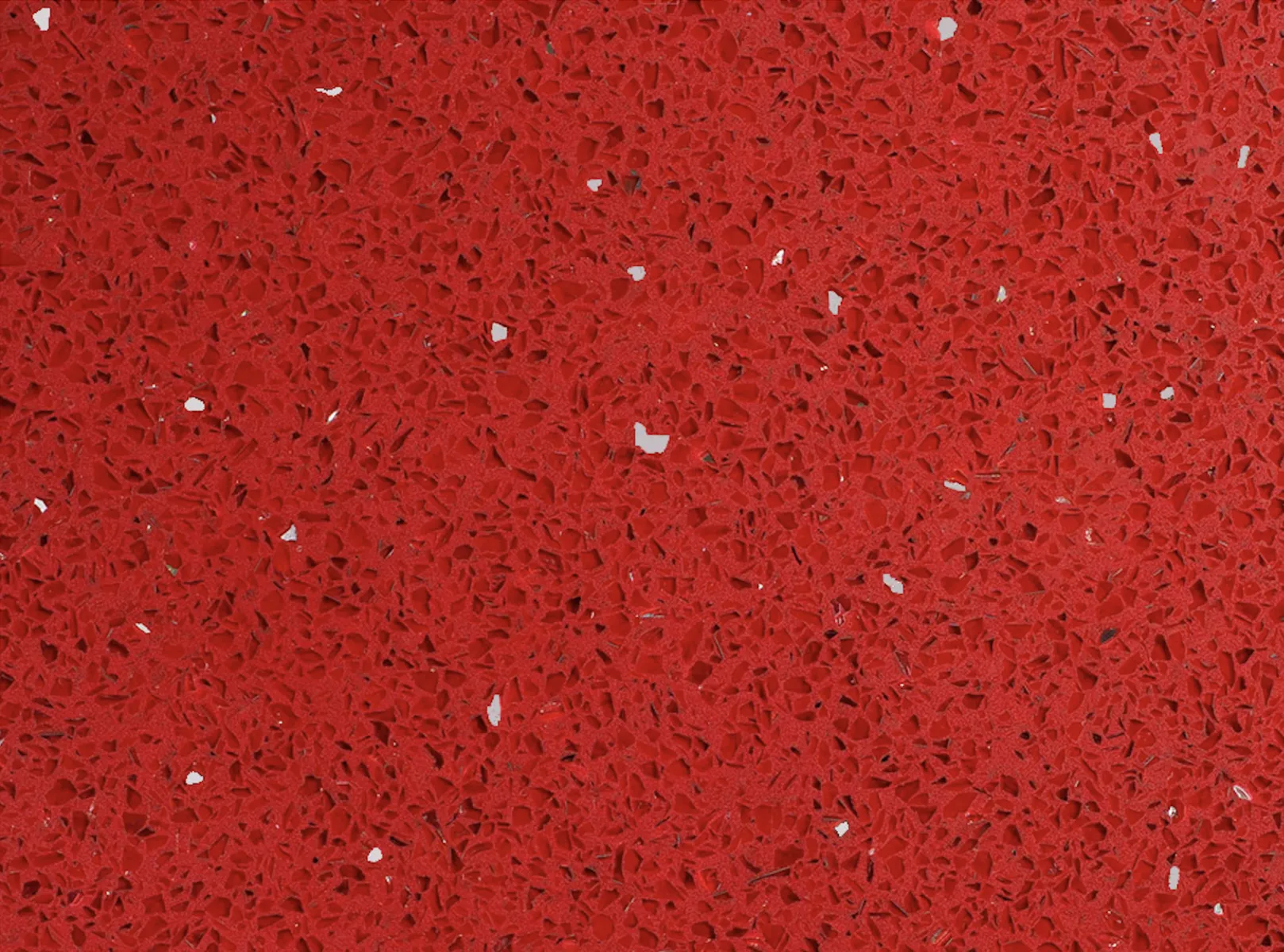 Closeup image of Vicostone Sparkling Red Red Quartz countertop slab