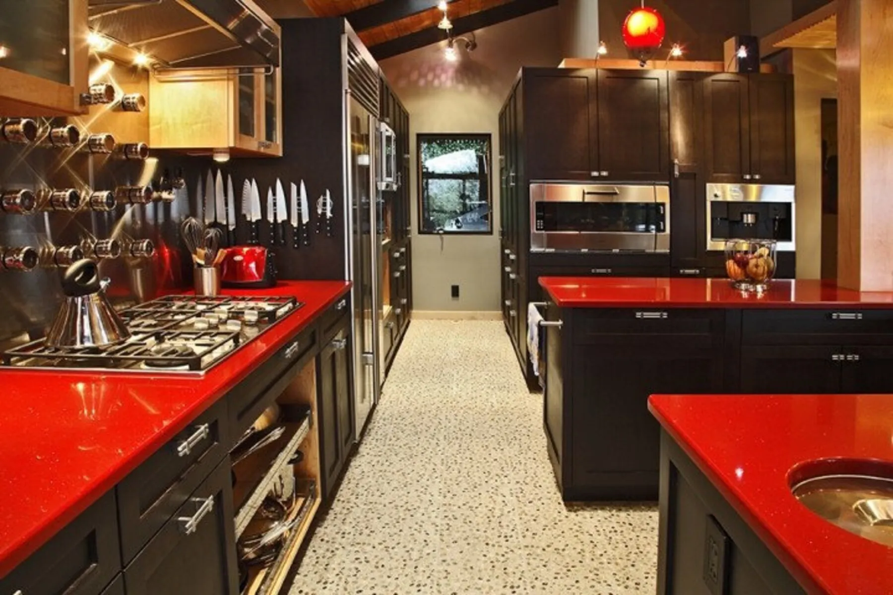 Image of installed Vicostone Sparkling Red Red Quartz countertops