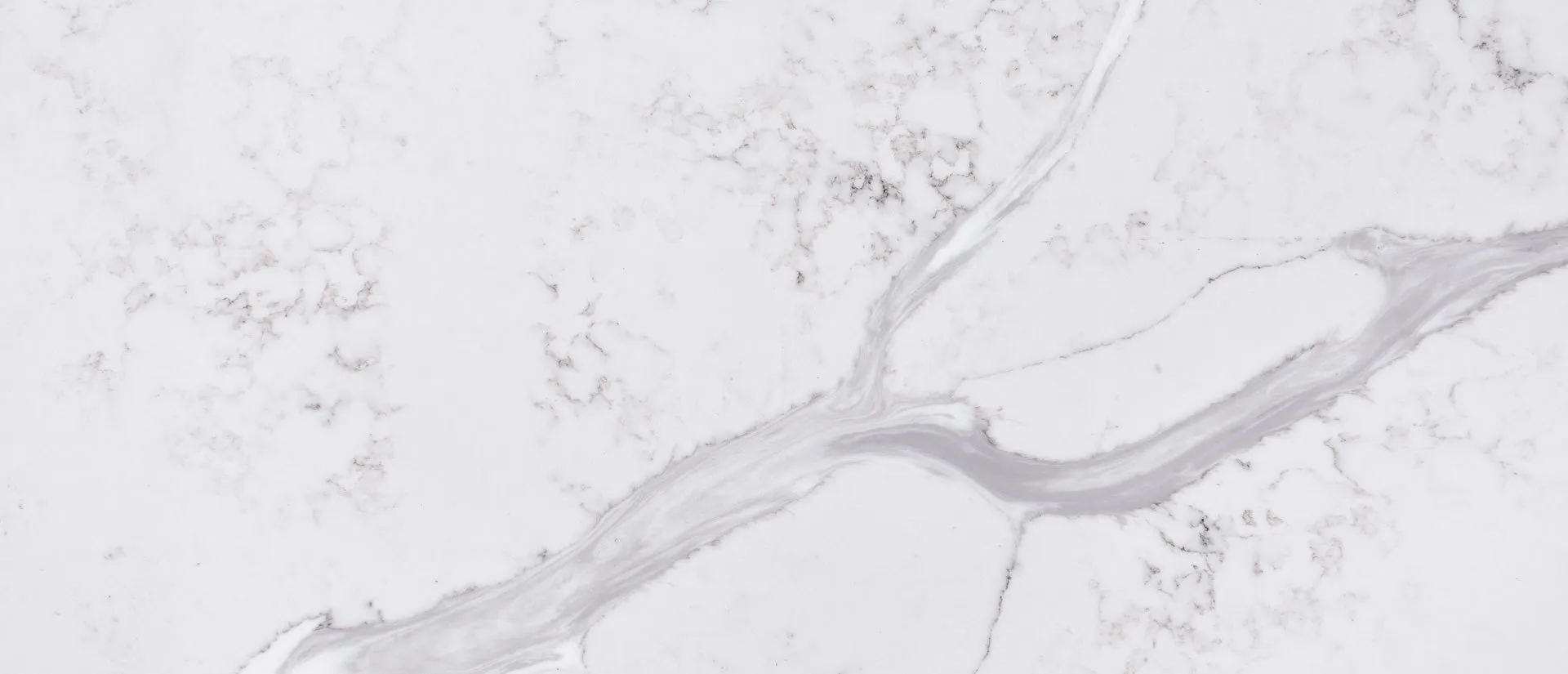 Closeup image of Q Quartz Calacatta Bolina Quartz countertop slab