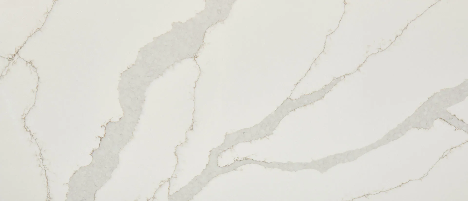 Closeup image of Q Quartz Calacatta Idillio White Quartz countertop slab