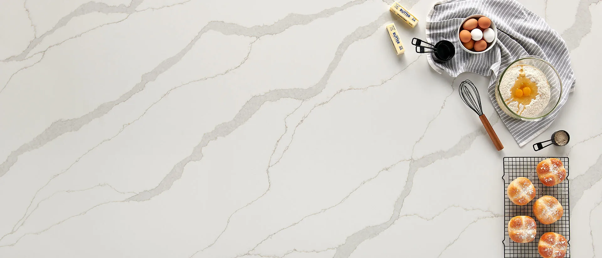 Image of installed Q Quartz Calacatta Idillio White Quartz countertops