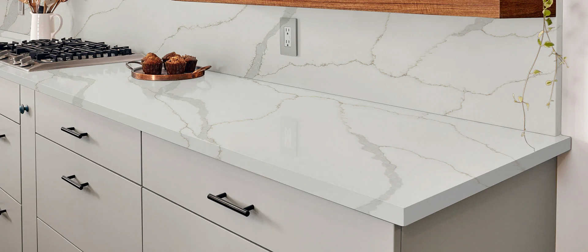 Image of installed Q Quartz Calacatta Idillio White Quartz countertops