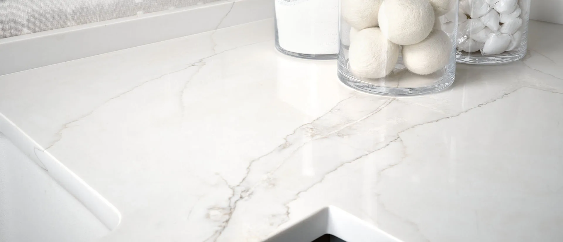 Image of installed Q Quartz Calacatta Izaro White Quartz countertops