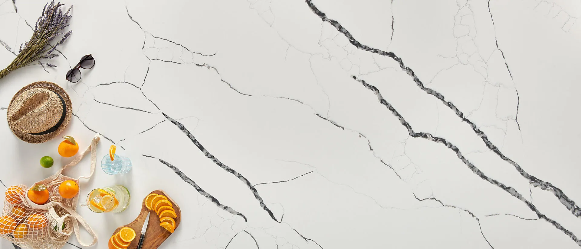 Image of installed Q Quartz Calacatta Laza Night White Quartz countertops