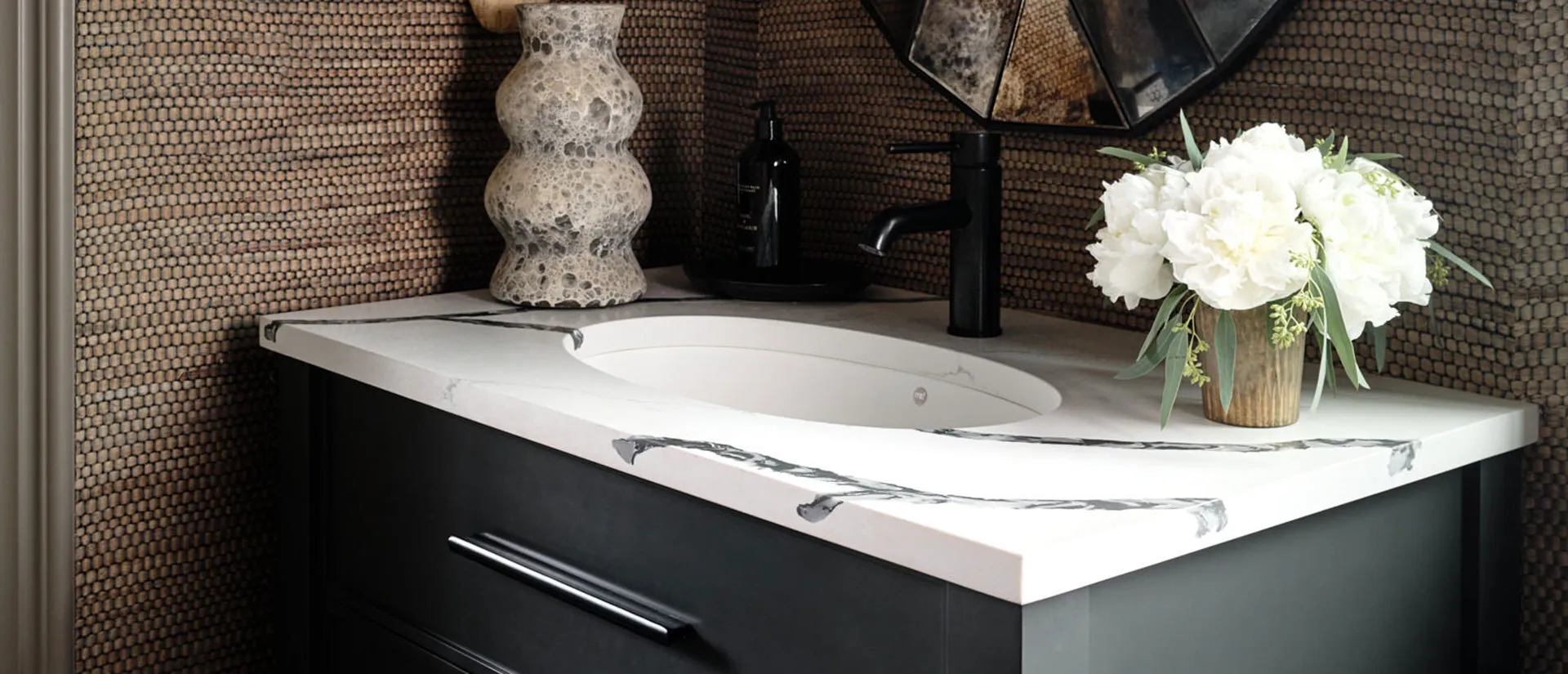 Image of installed Q Quartz Calacatta Laza Night White Quartz countertops