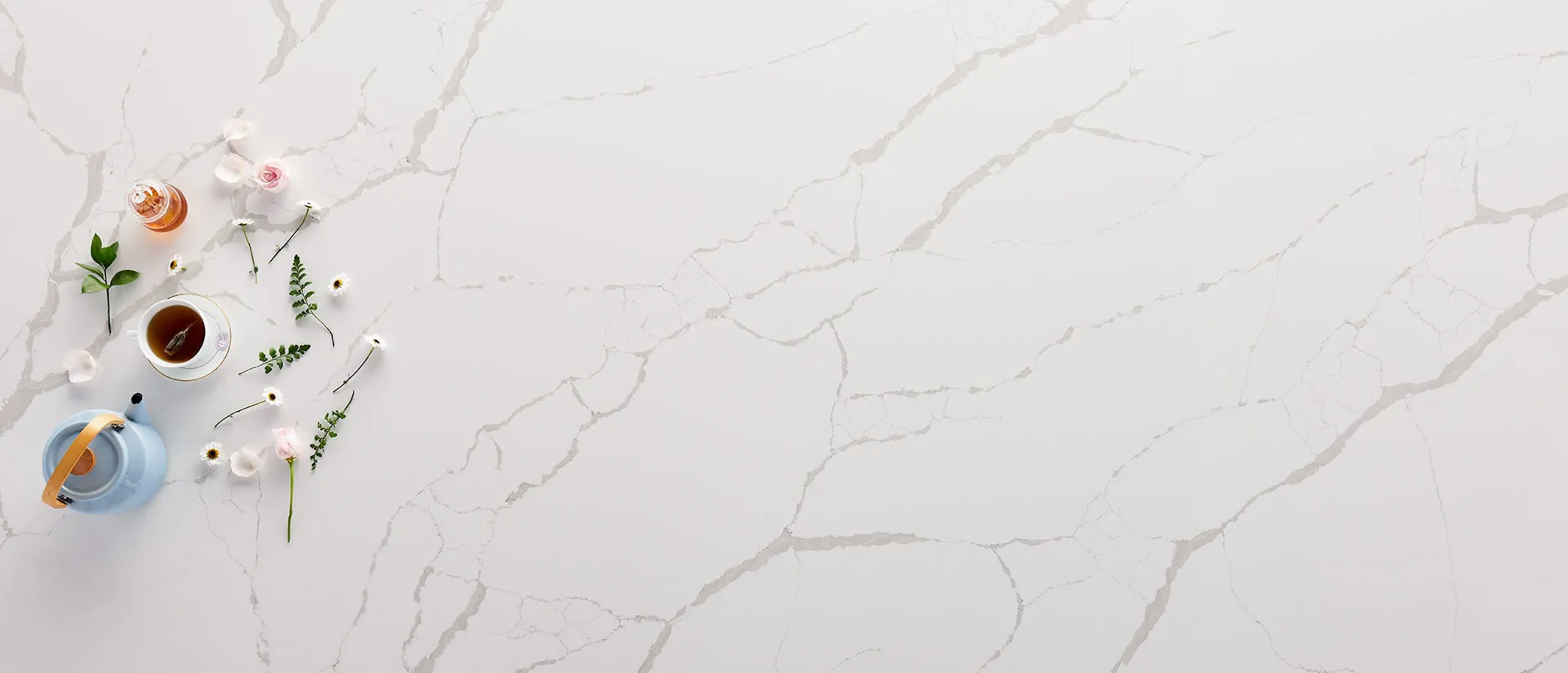 Image of installed Q Quartz New Calacatta Laza White Quartz countertops