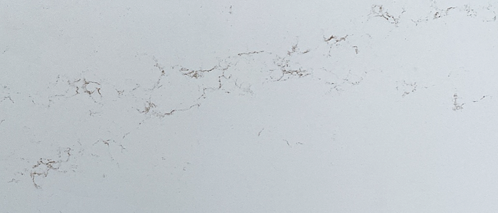 Closeup image of CRS Quartz Pluma Oro White Quartz countertop slab