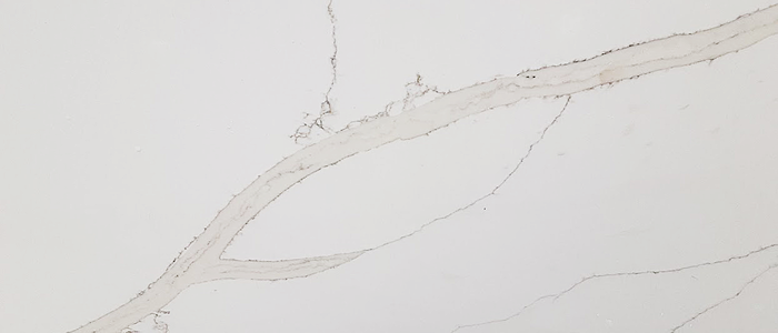 Closeup image of Arizona Tile Della Terra Bertoli Quartz countertop slab