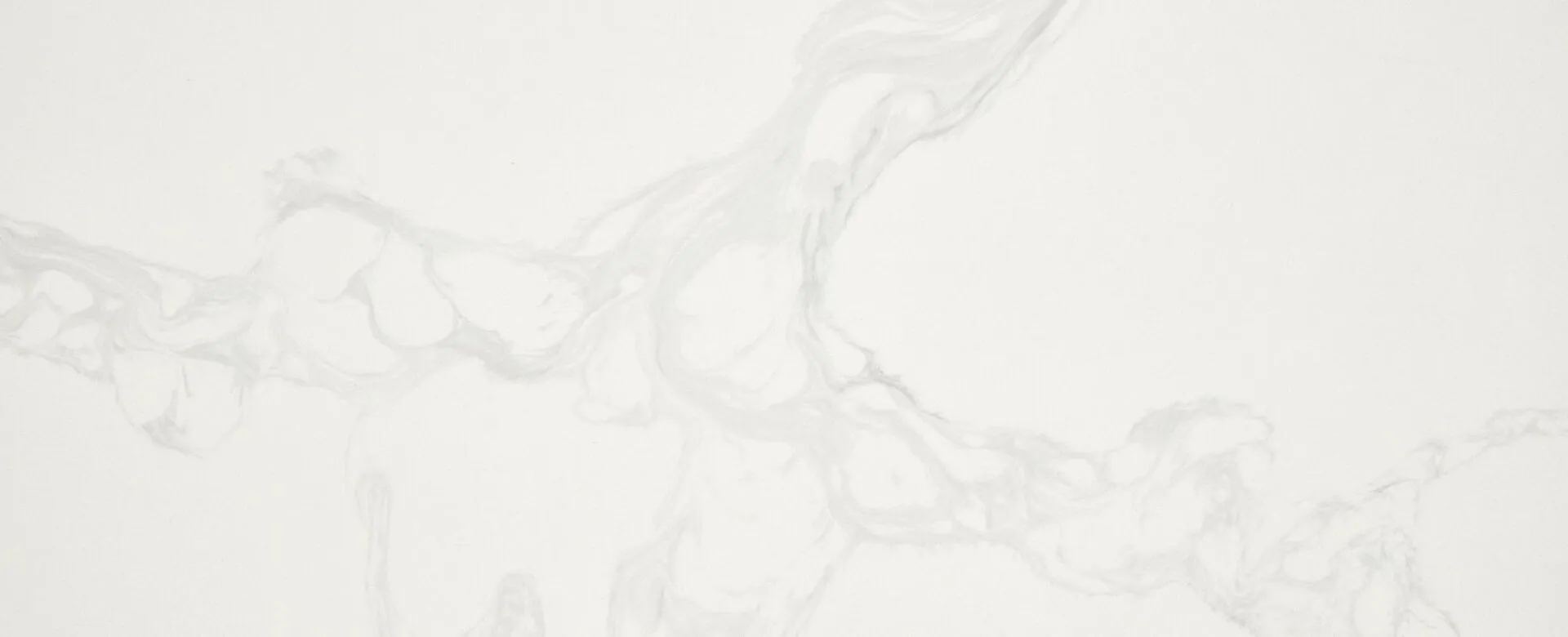 Closeup image of Arizona Tile Calacatta Bellatrix White Quartz countertop slab