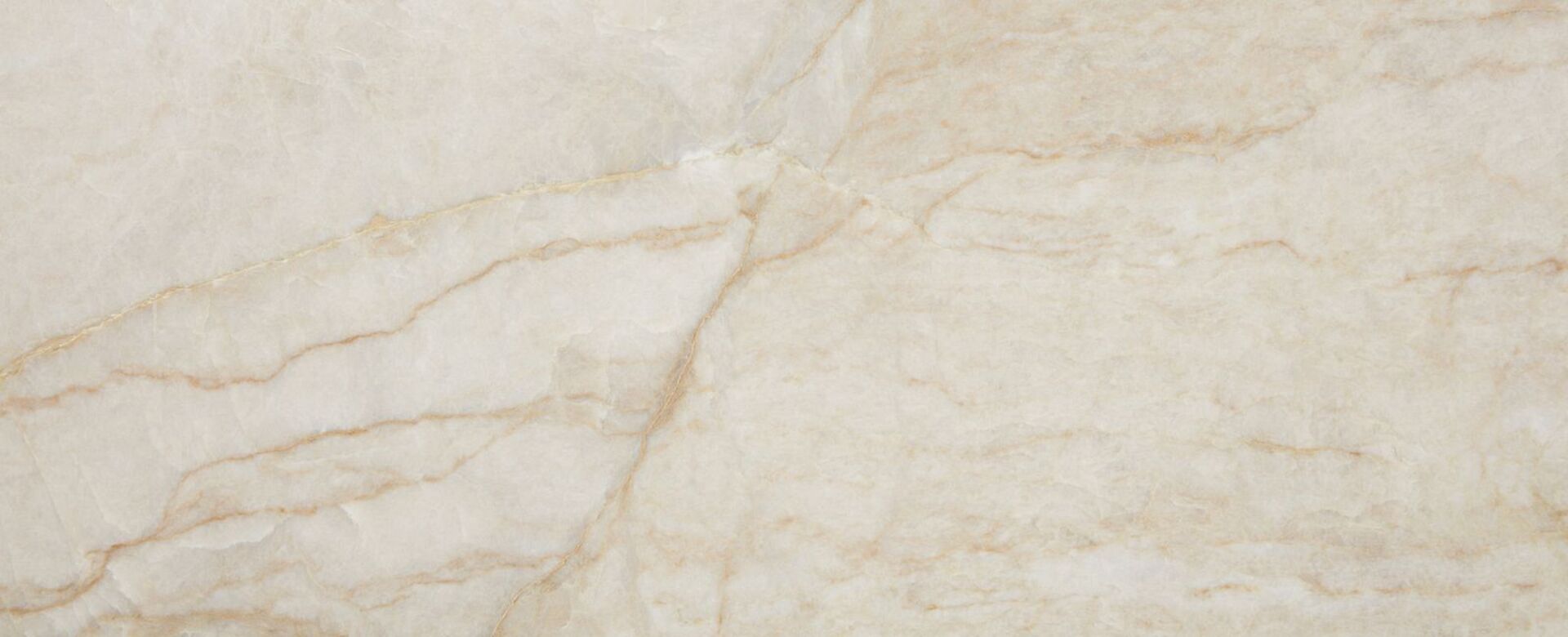 Closeup image of Perla Venato White Quartzite countertop slab