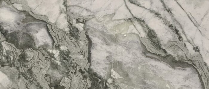 Closeup image of Ice Onyx White Marble countertop slab