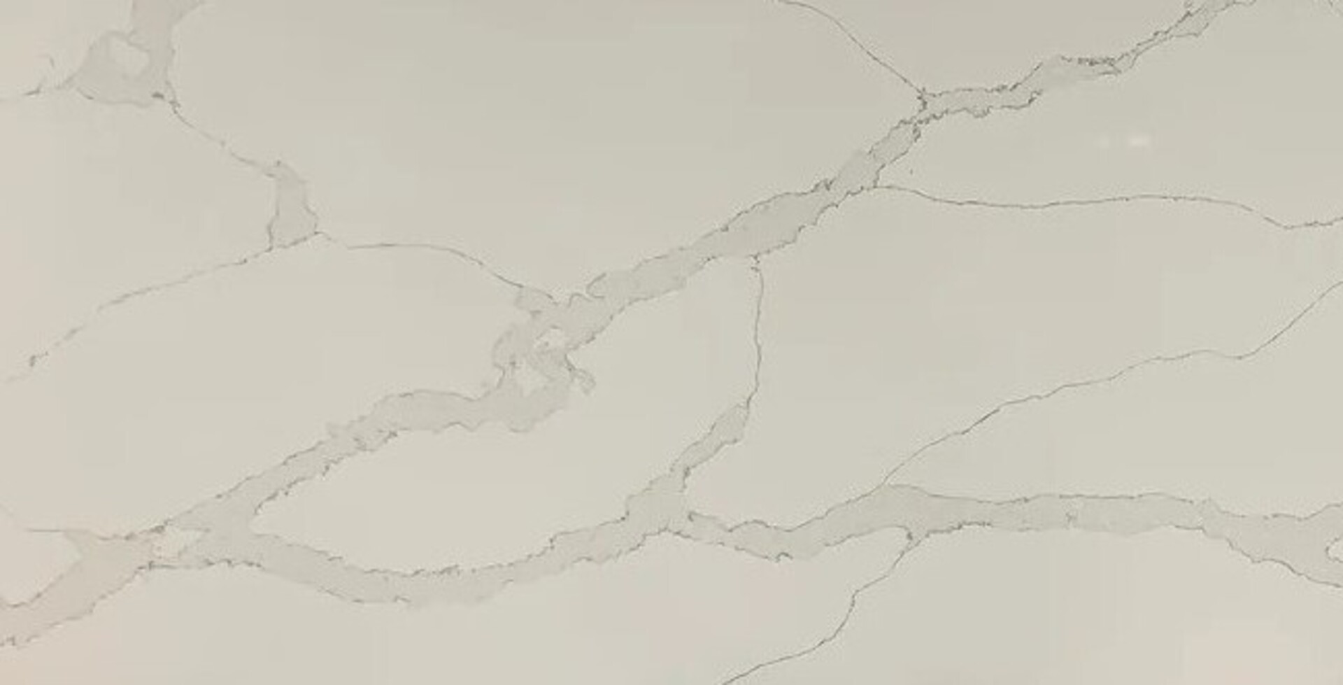 Closeup image of Aggranite Calacatta Tuscany White Quartz countertop slab