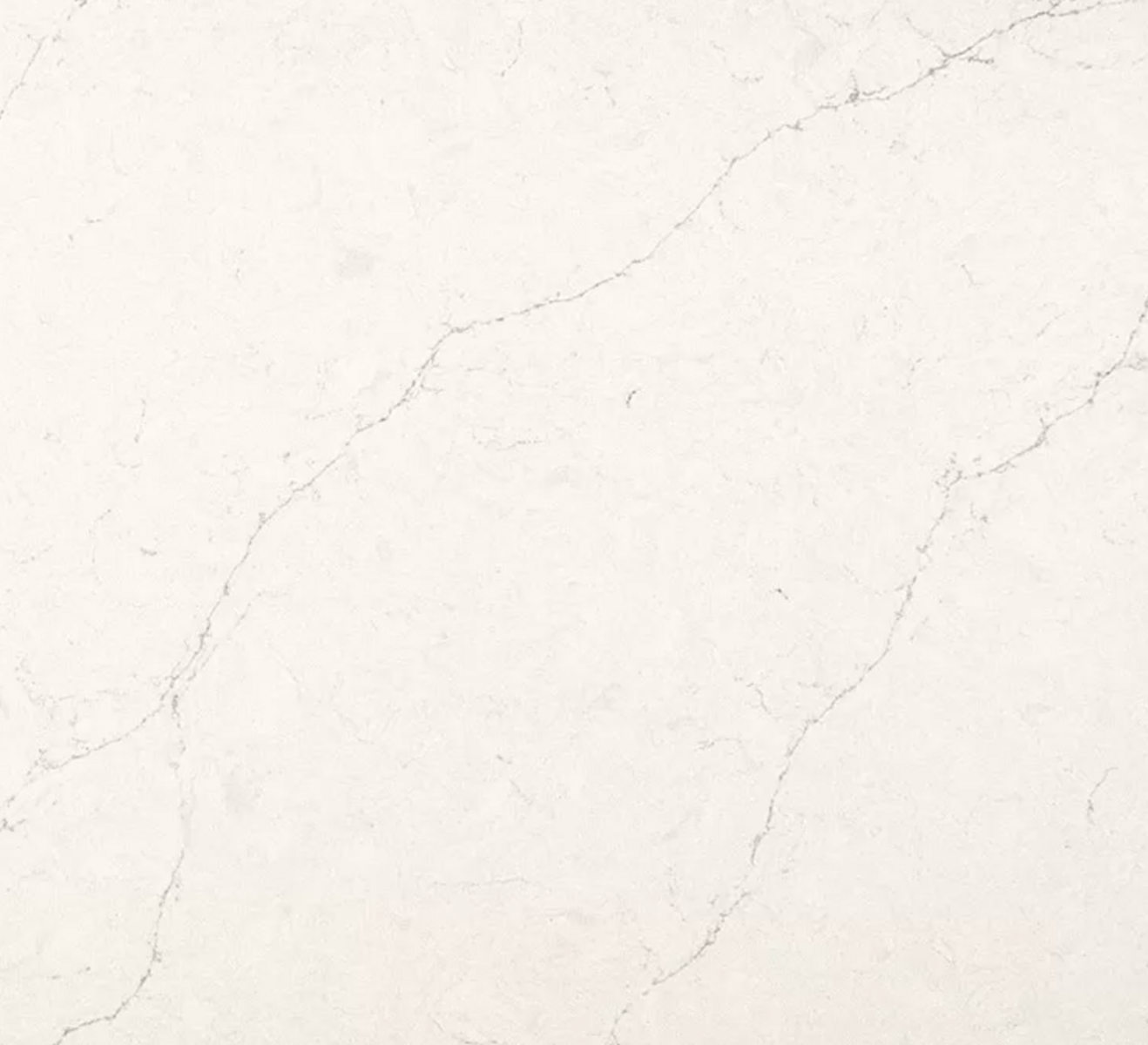 Closeup image of Q Quartz Valor White Quartz countertop slab