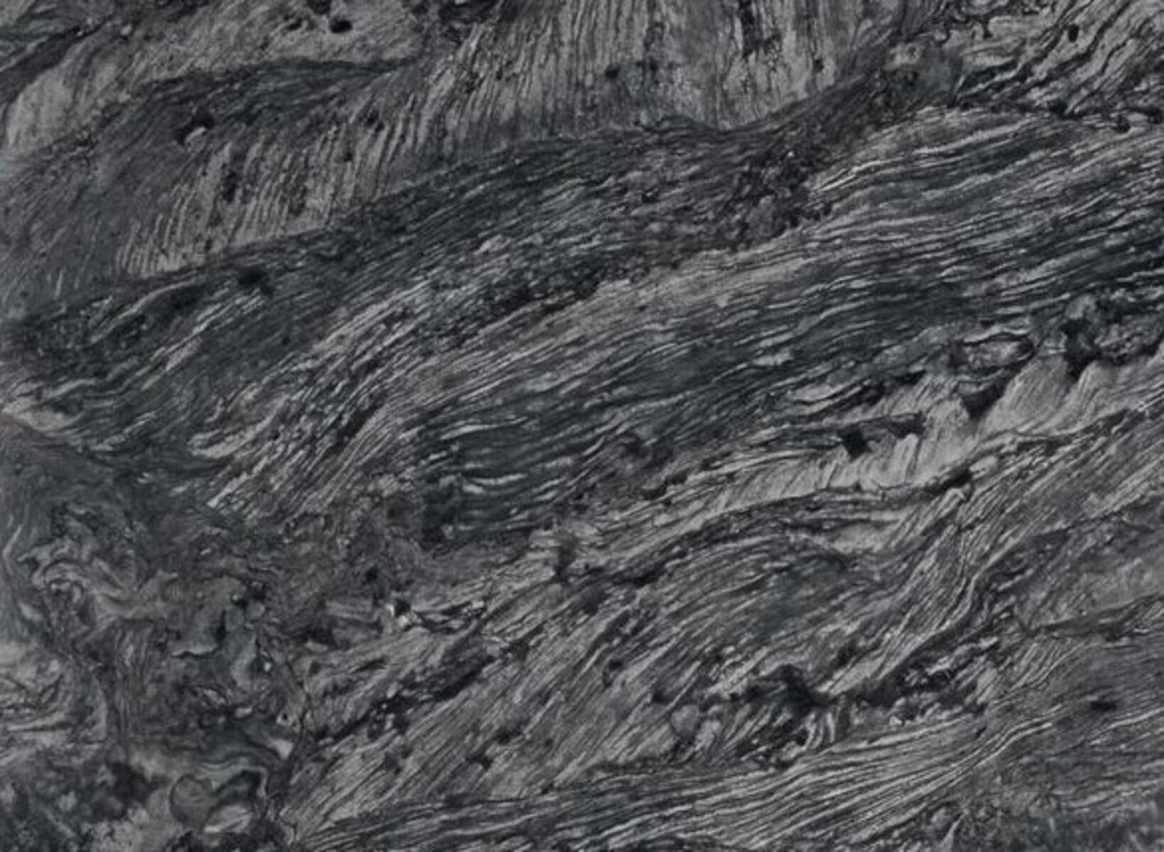 Closeup image of Adamantium Quartzite countertop slab