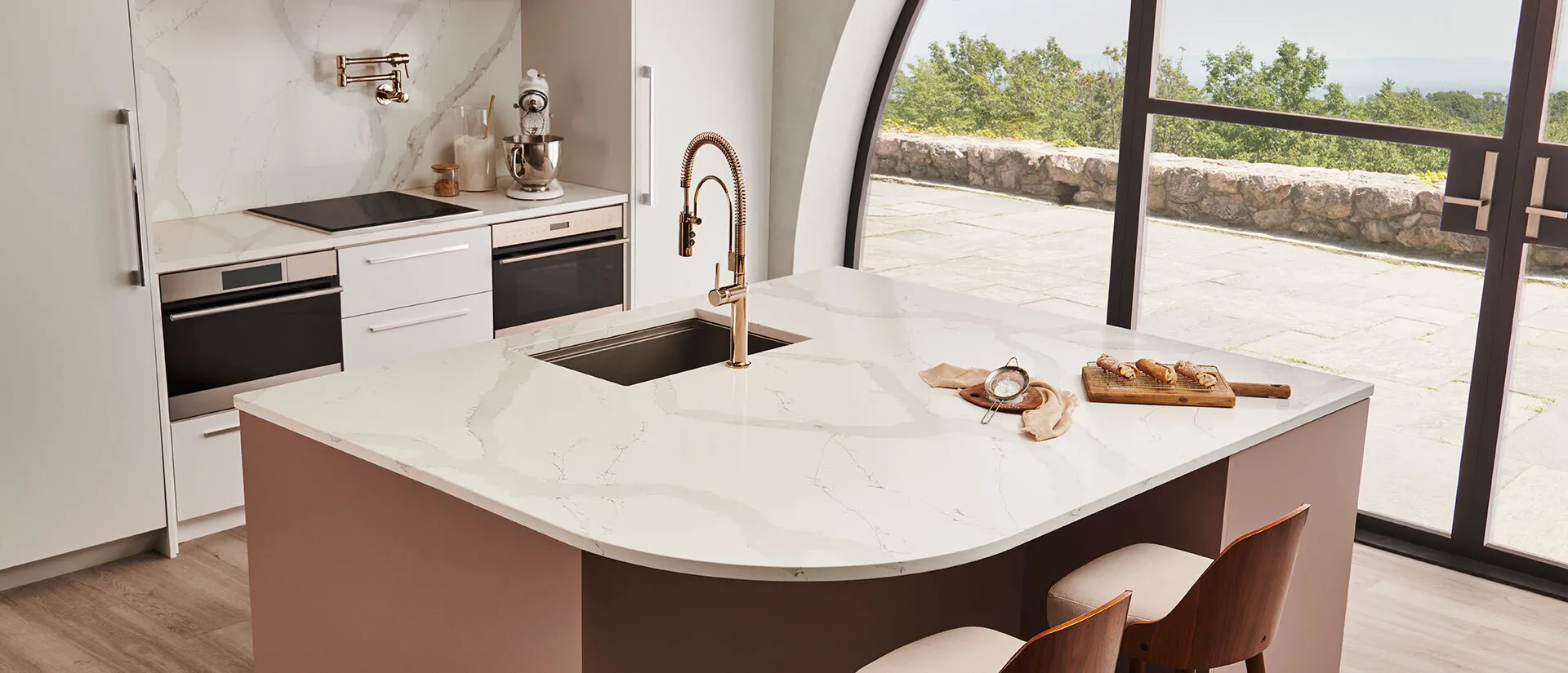 Image of installed Q Quartz Calacatta Azai Quartz countertops