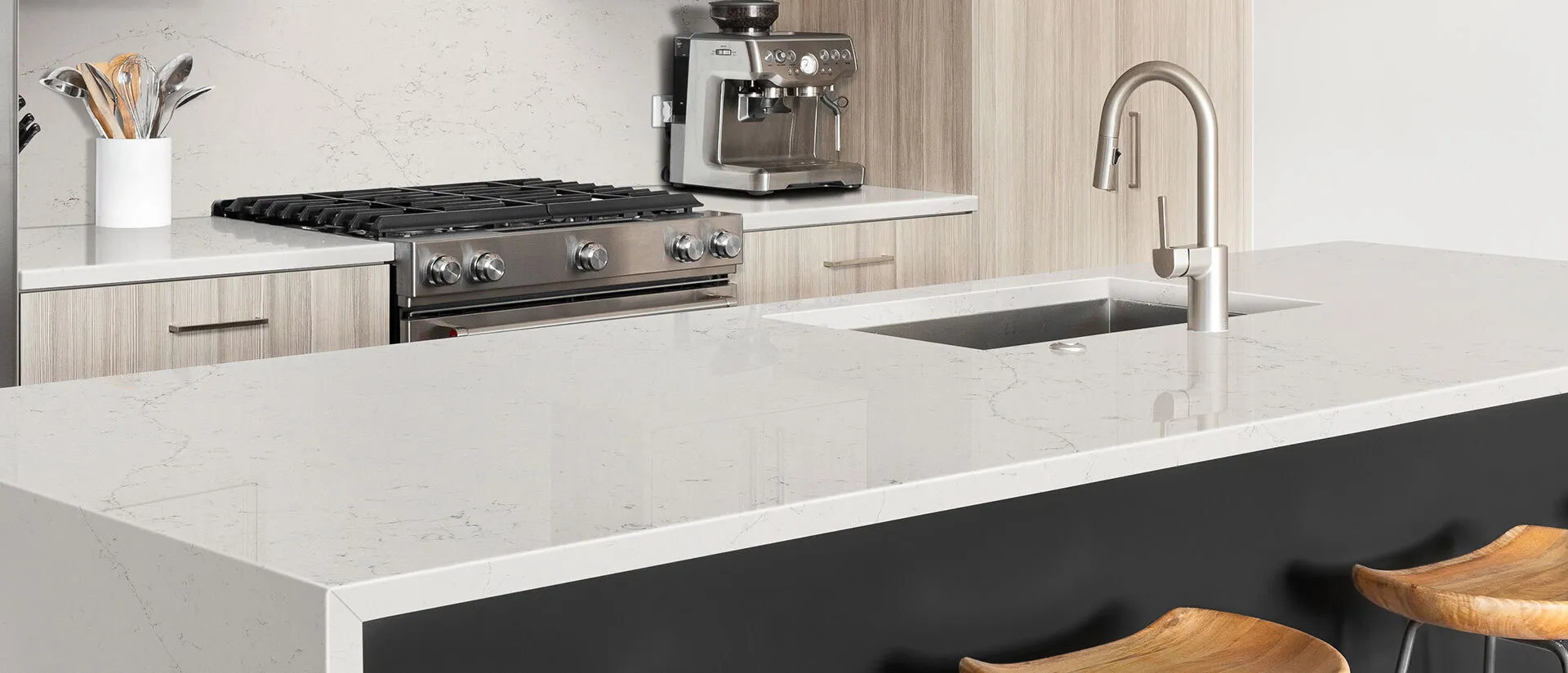 Image of installed Q Quartz Calacatta Botanica Quartz countertops