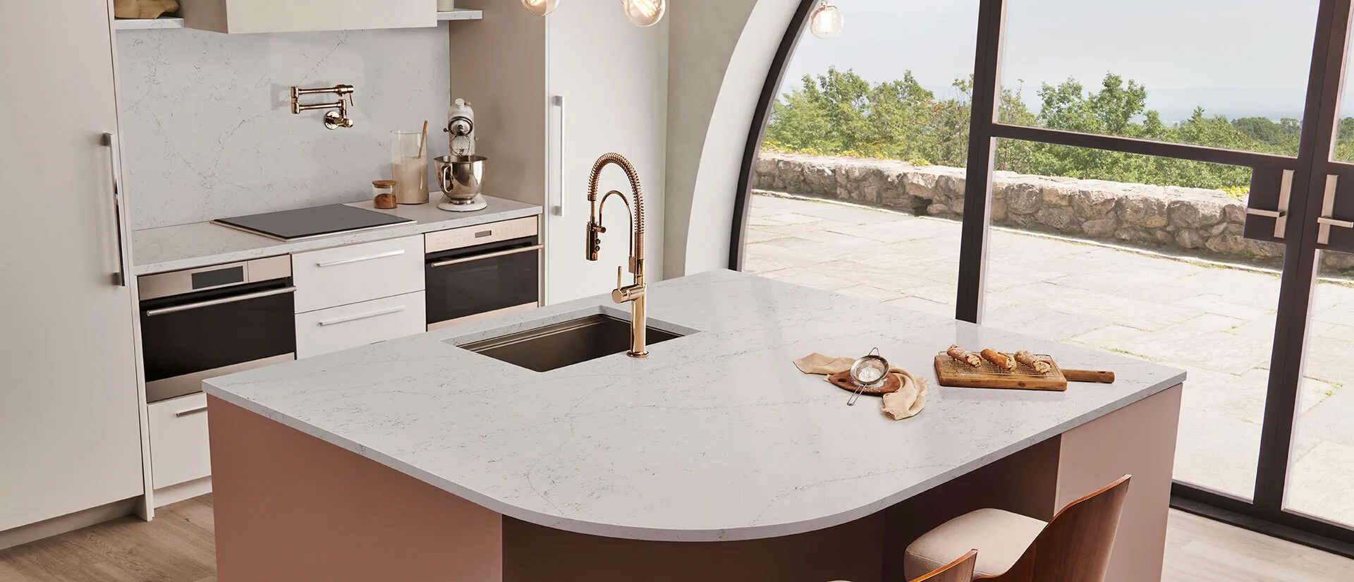 Image of installed Q Quartz Calacatta Botanica Quartz countertops