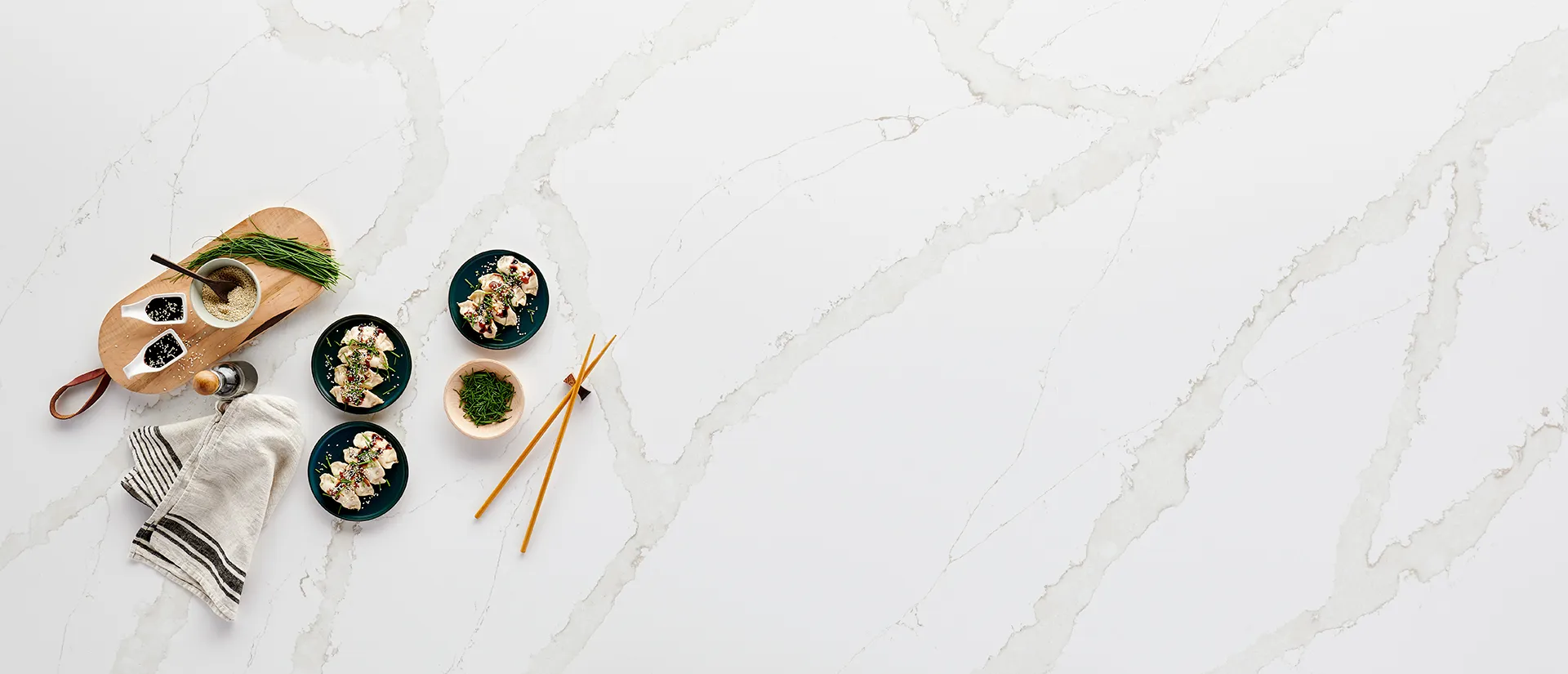 Image of installed Q Quartz Calacatta Goa Quartz countertops