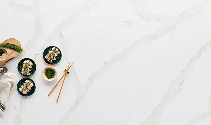 Image of installed Q Quartz Calacatta Goa Quartz countertops