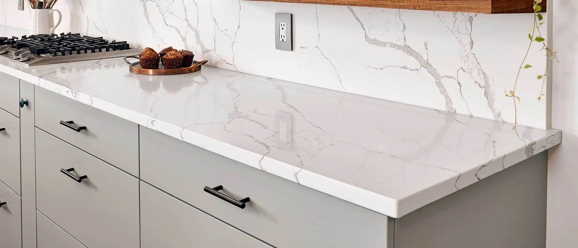 Image of installed Q Quartz Calacatta Laza Quartz countertops