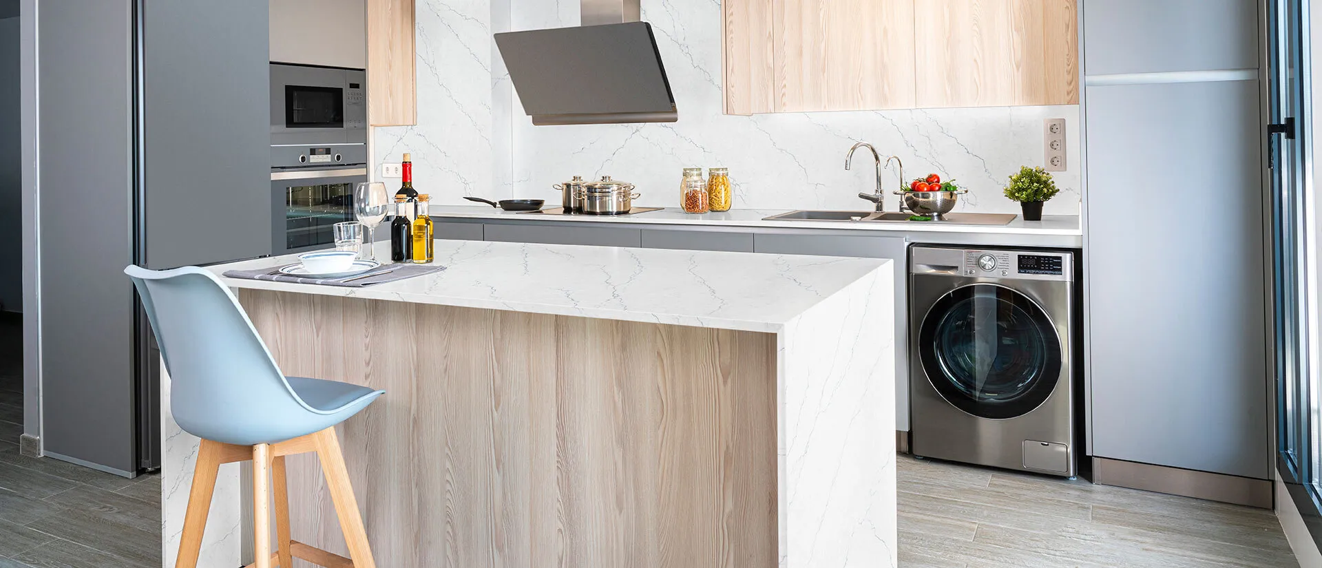 Image of installed Q Quartz Calacatta Miraggio Cielo White Quartz countertops