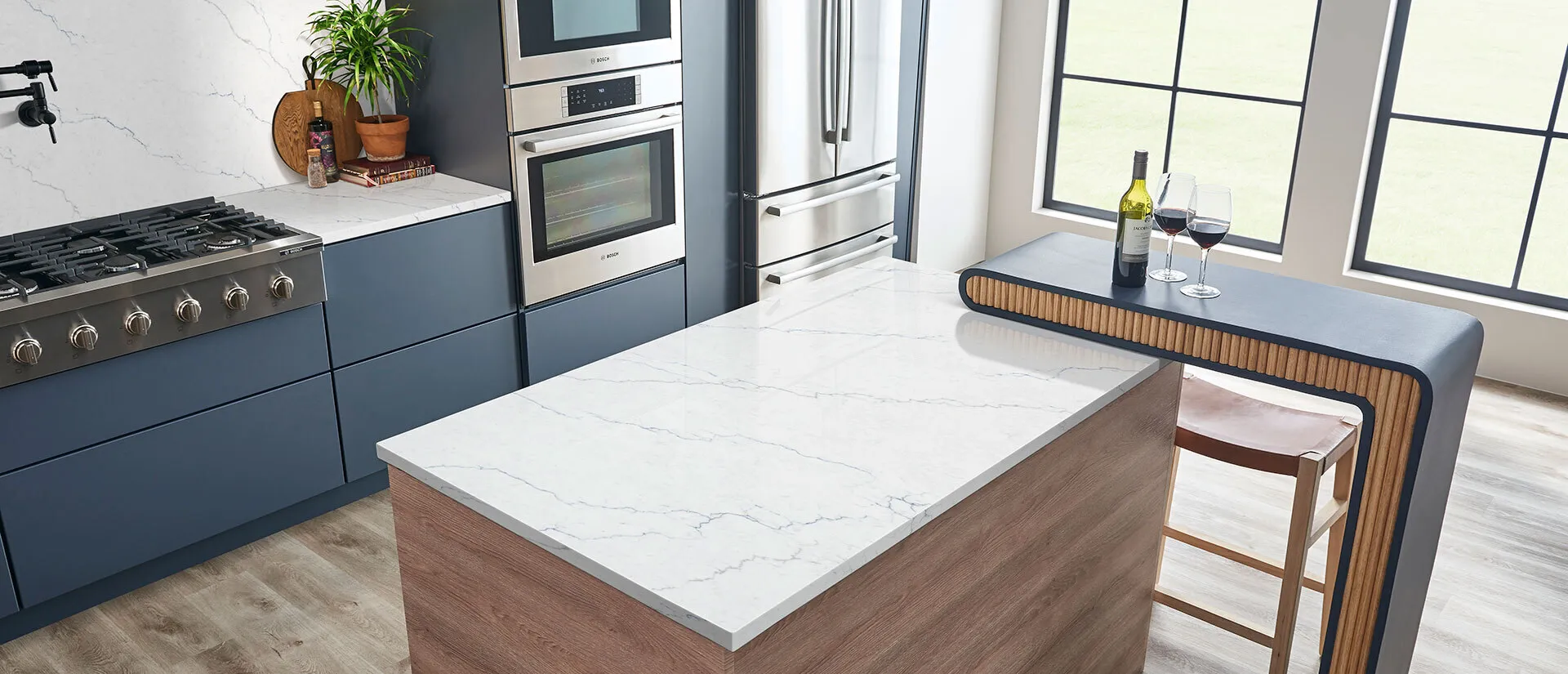 Image of installed Q Quartz Calacatta Miraggio Cielo White Quartz countertops