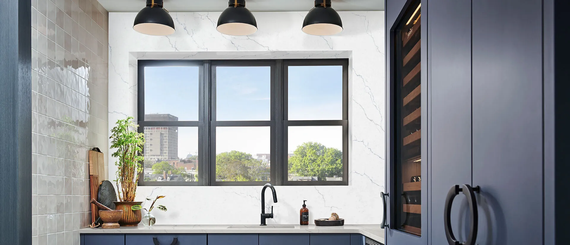 Image of installed Q Quartz Calacatta Miraggio Cielo White Quartz countertops