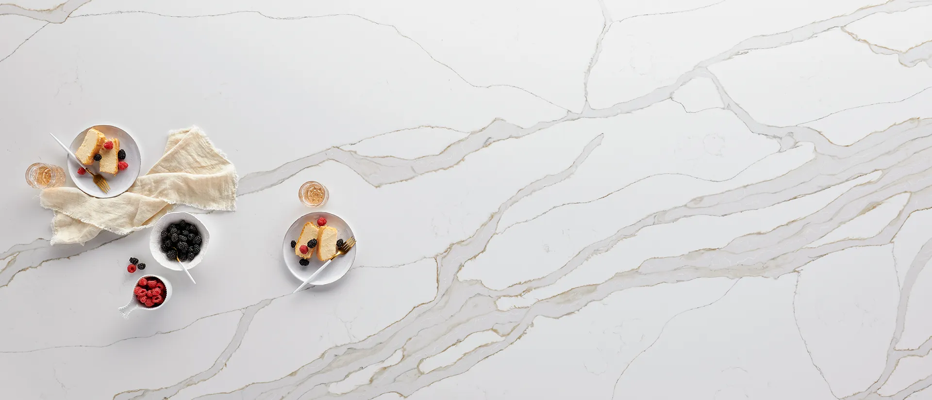 Image of installed Q Quartz Calacatta Solessio Quartz countertops