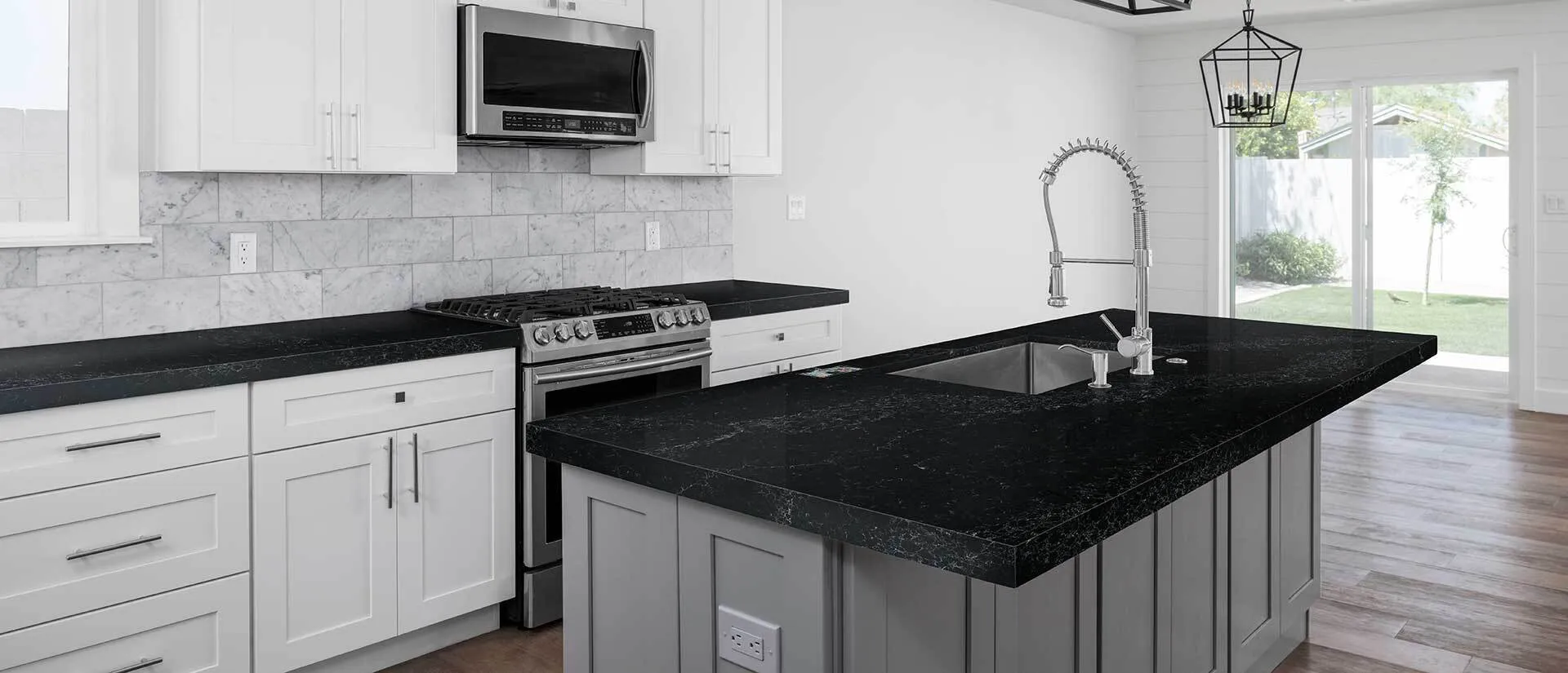 Image of installed Q Quartz Midnight Corvo Quartz countertops