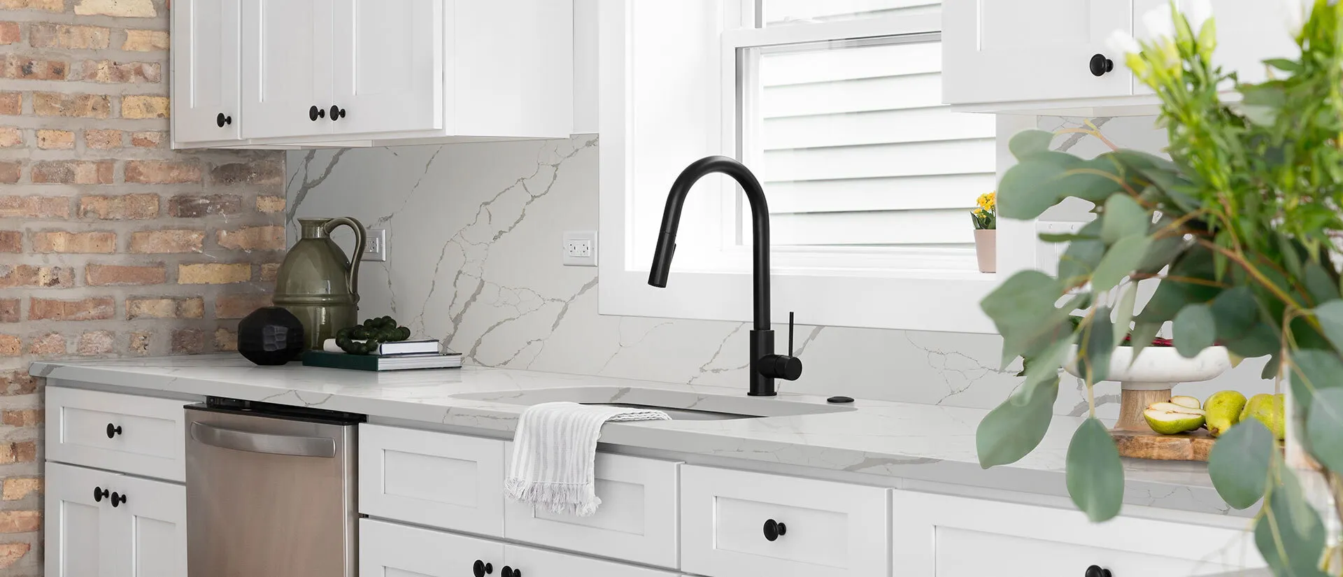 Image of installed Q Quartz New Calacatta Laza White Quartz countertops