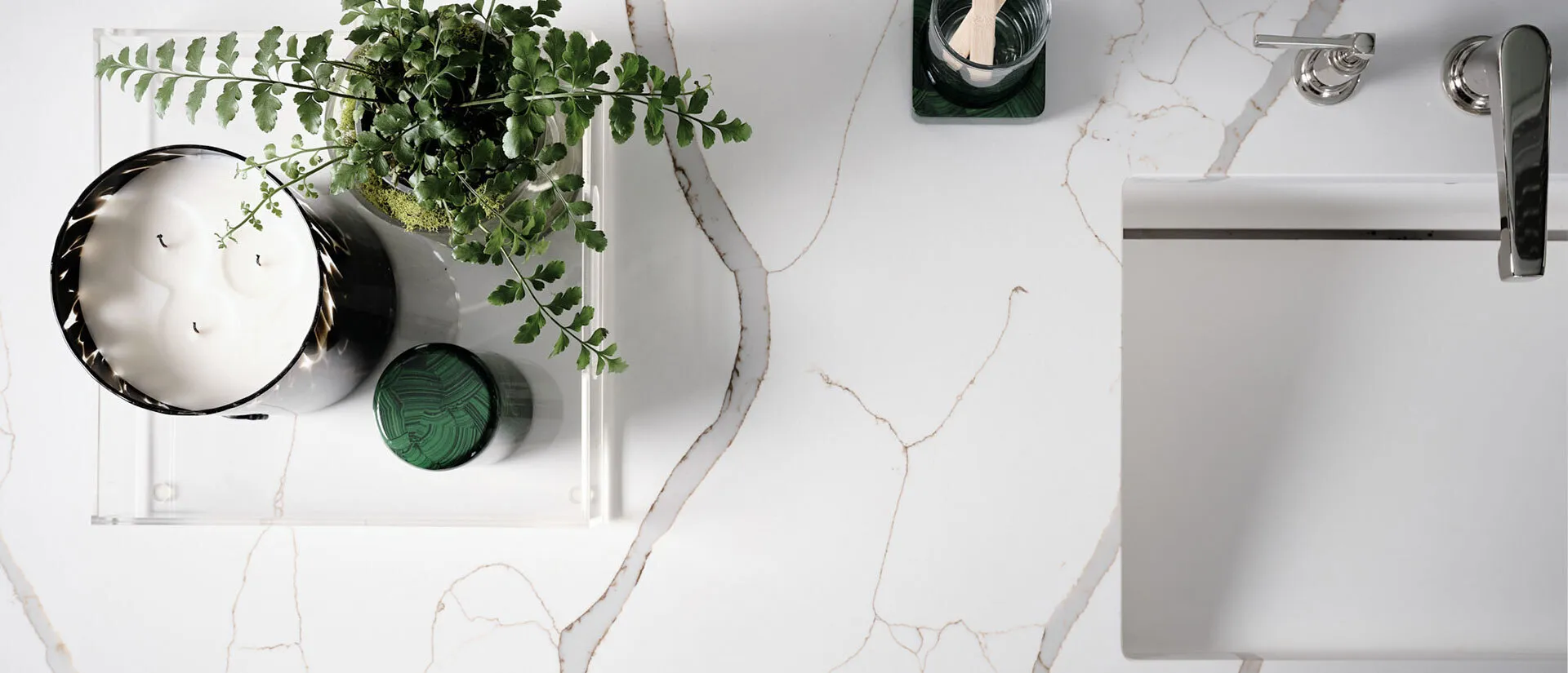 Image of installed Q Quartz New Calacatta Laza Gold Quartz countertops