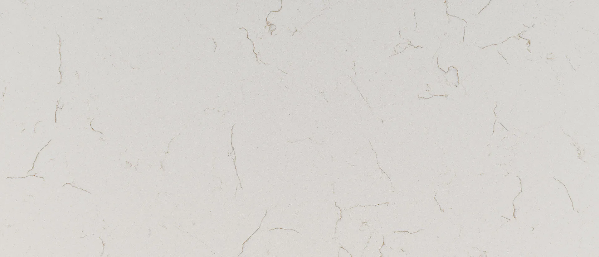Closeup image of Q Quartz Carrara Trigato White Quartz countertop slab