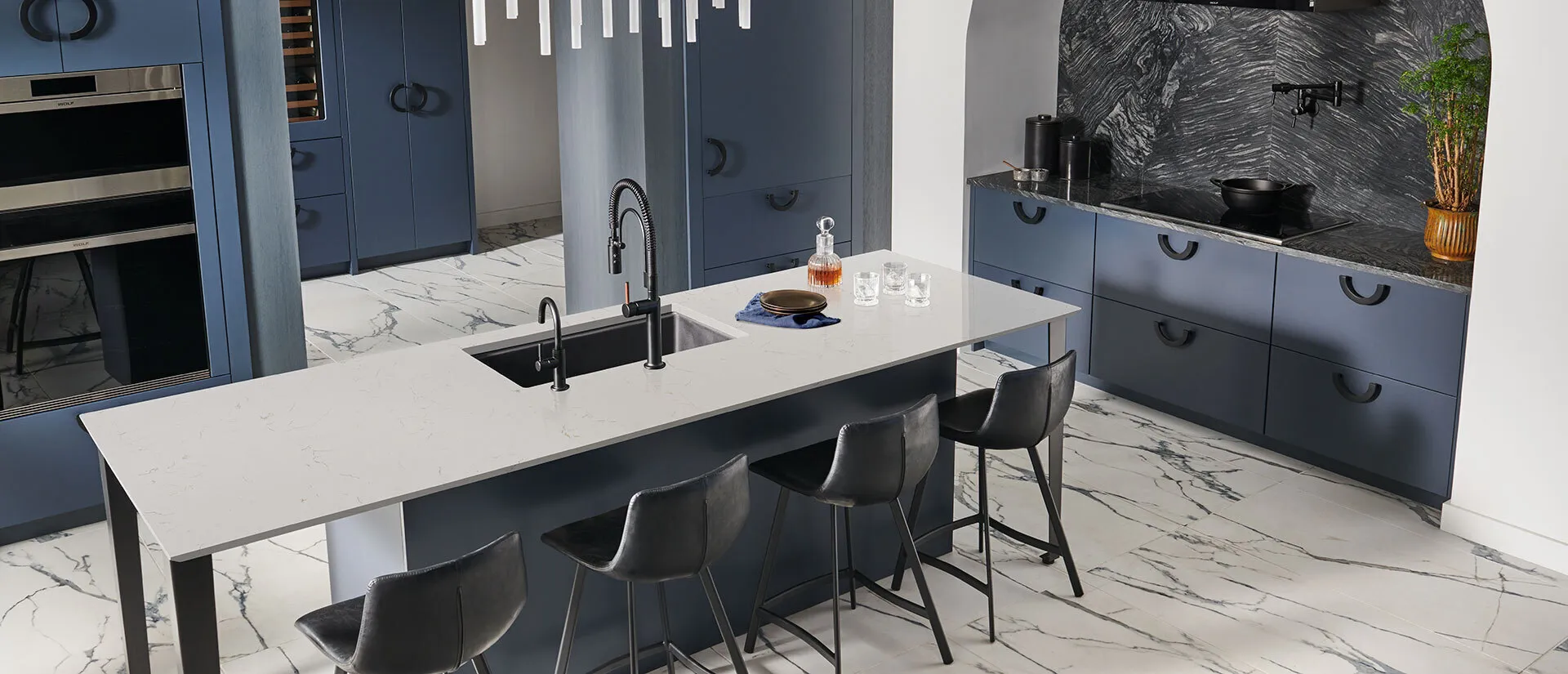 Image of installed Q Quartz Carrara Trigato White Quartz countertops