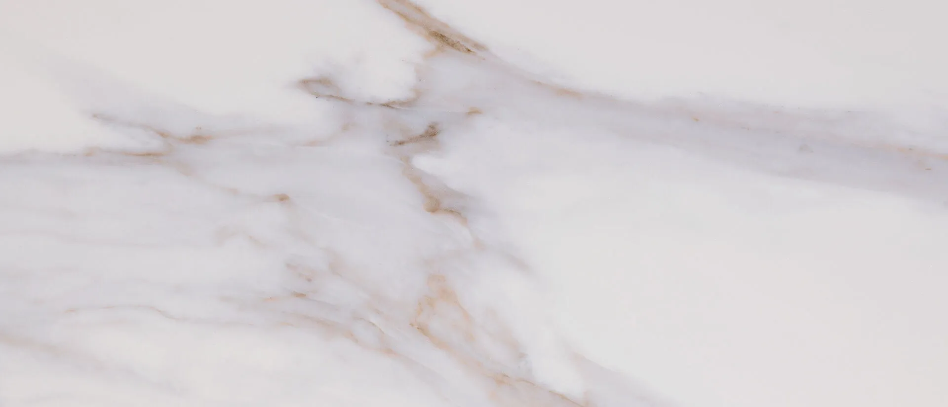 Closeup image of Q Quartz Calacatta Castana White Quartz countertop slab