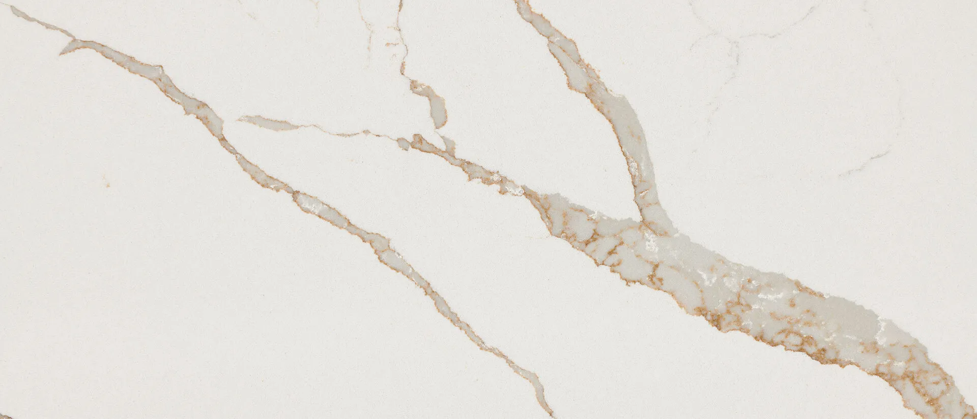Closeup image of Q Quartz Calacatta Laza Oro White Quartz countertop slab