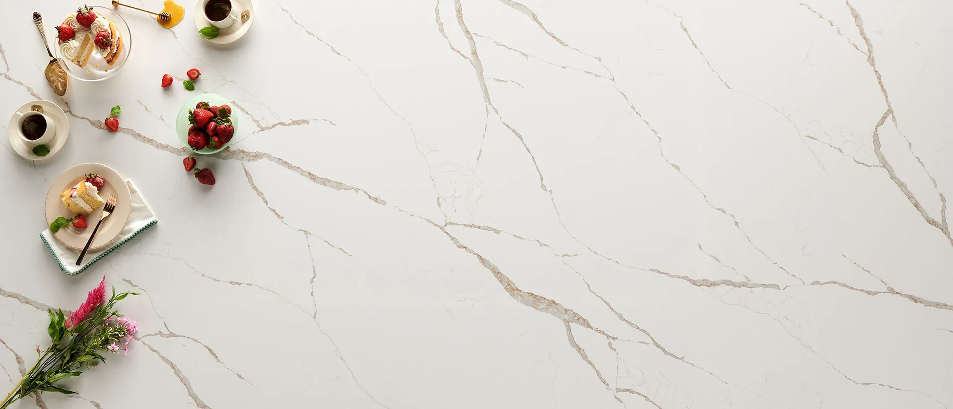 Image of installed Q Quartz Calacatta Laza Oro White Quartz countertops