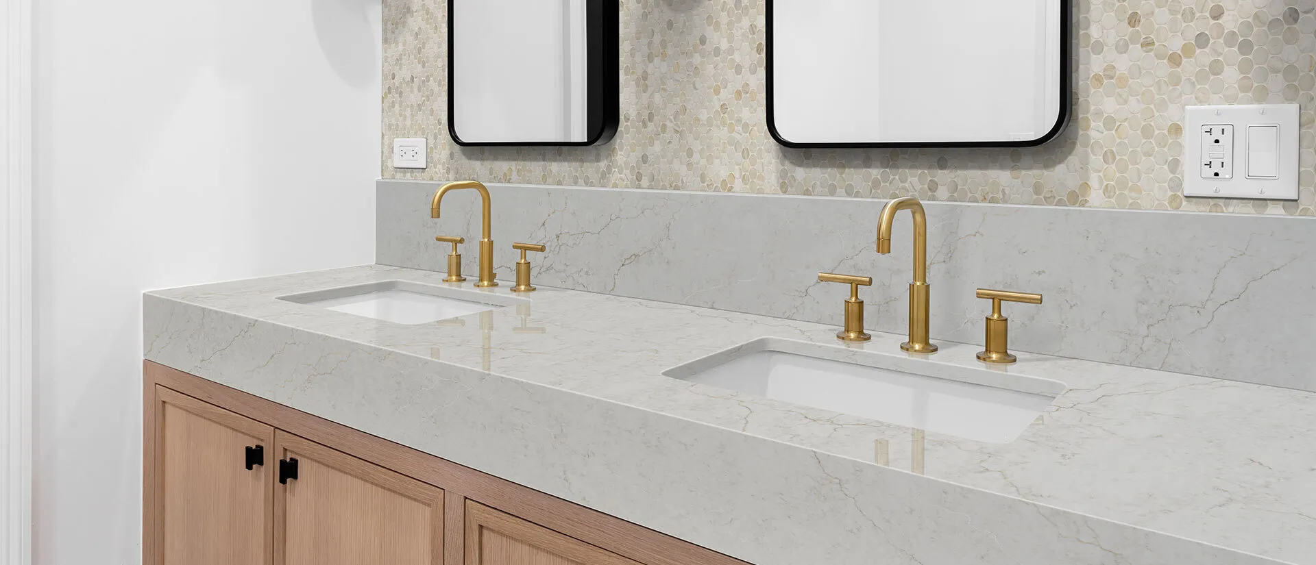 Image of installed Q Quartz Calacatta Miraggio Cove White Quartz countertops