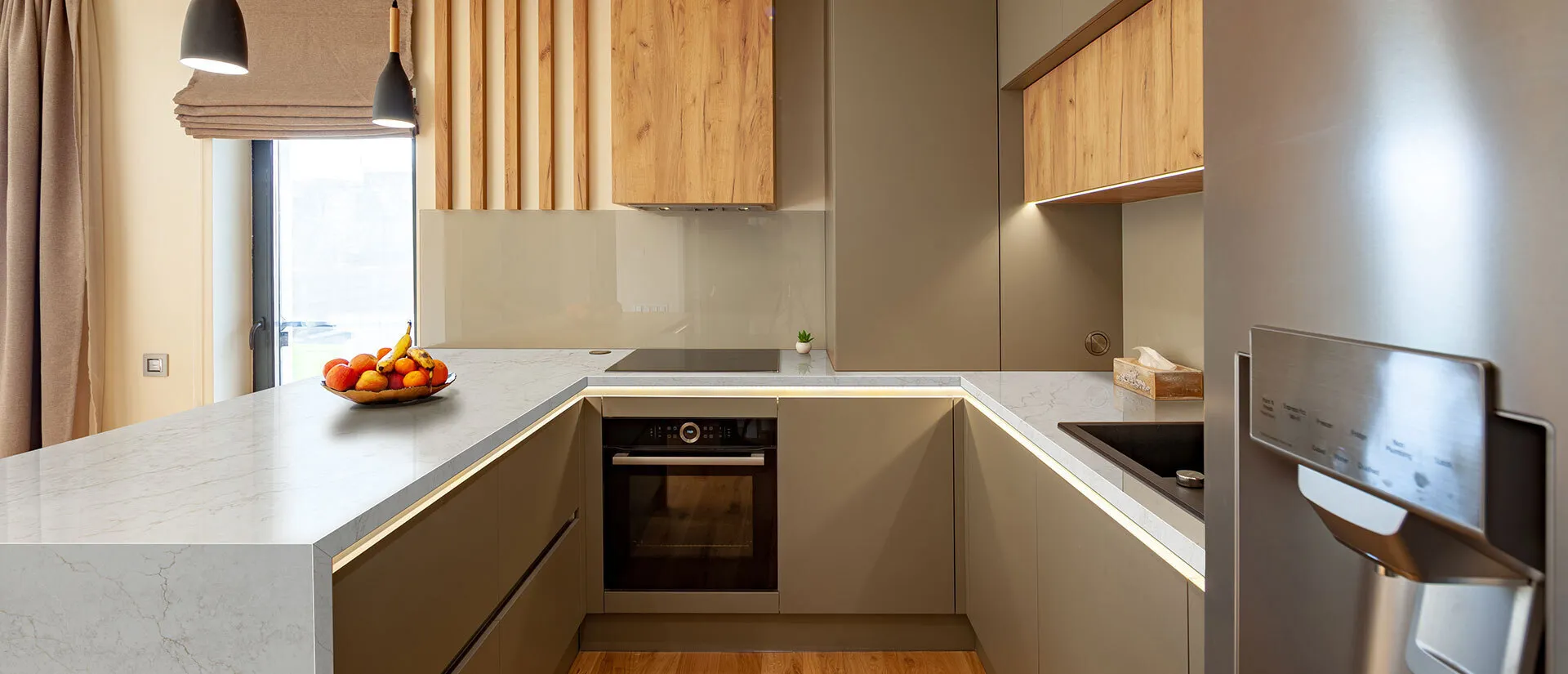 Image of installed Q Quartz Calacatta Miraggio Cove White Quartz countertops
